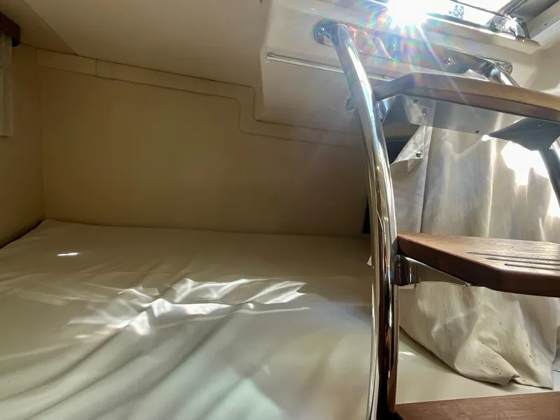 Slide: The Image of Interior cabin of 2017 Regal 28 Express with sunlight through window. - 18