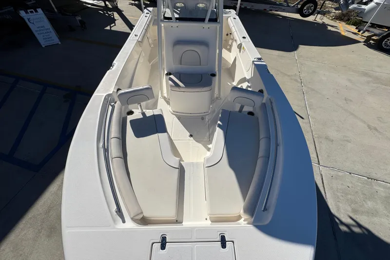 Slide: The Image of 2022 Sea Born LX22 Center Console boat with spacious seating and sleek design. - 21