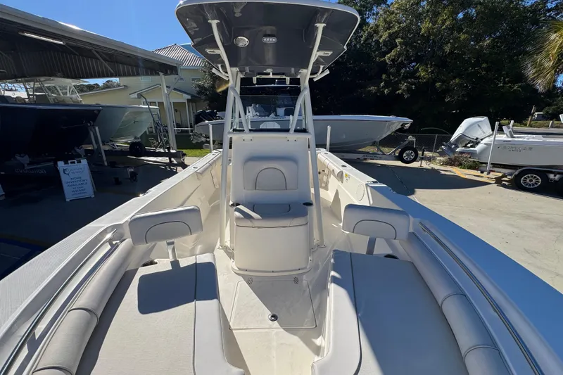 Slide: The Image of 2022 Sea Born LX22 Center Console boat with spacious seating and modern design. - 23