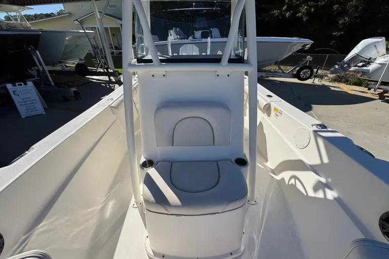 Slide: The Image of 2022 Sea Born LX22 Center Console boat interior with seating and cup holders. - 24