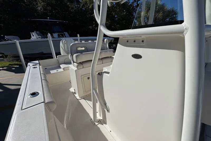 Slide: The Image of 2022 Sea Born LX22 Center Console boat interior with seating and console details. - 26
