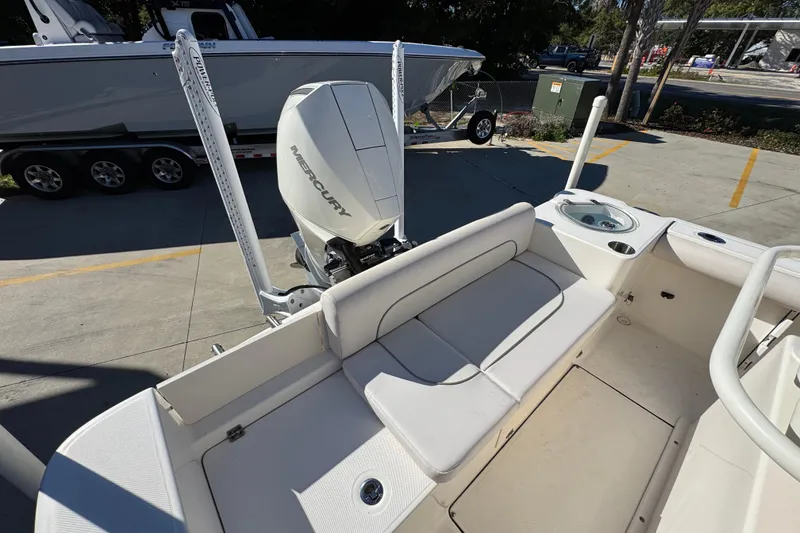 Slide: The Image of 2022 Sea Born LX22 Center Console boat with Mercury engine, docked outdoors. - 41