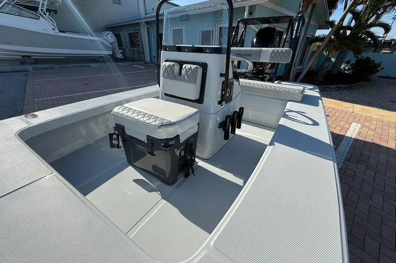 Slide: The Image of 2026 Action Craft 17 FLYFISHER boat interior with seating and storage. - 13
