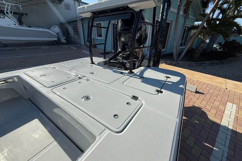 Slide: The Image of 2026 Action Craft 17 Flyfisher boat with sleek deck design and powerful engine. - 8