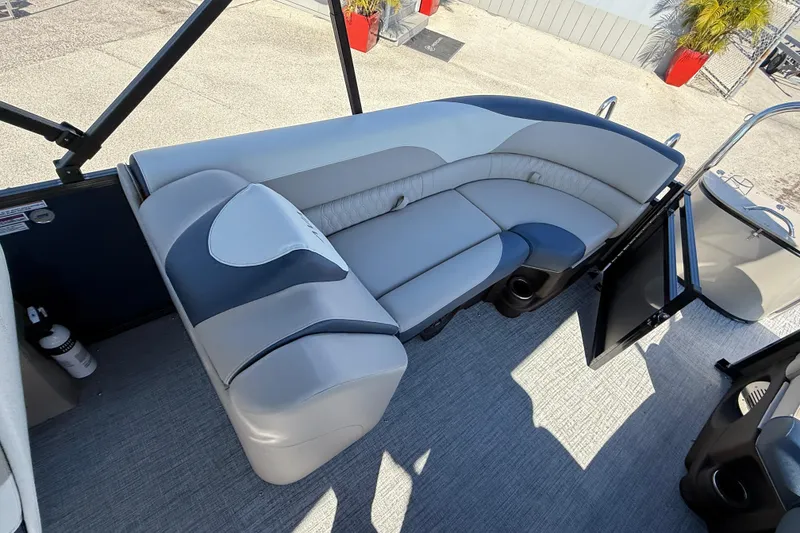 Slide: The Image of 2026 Avalon 2385 LSZ Quad Lounger interior with plush seating and modern design. - 18