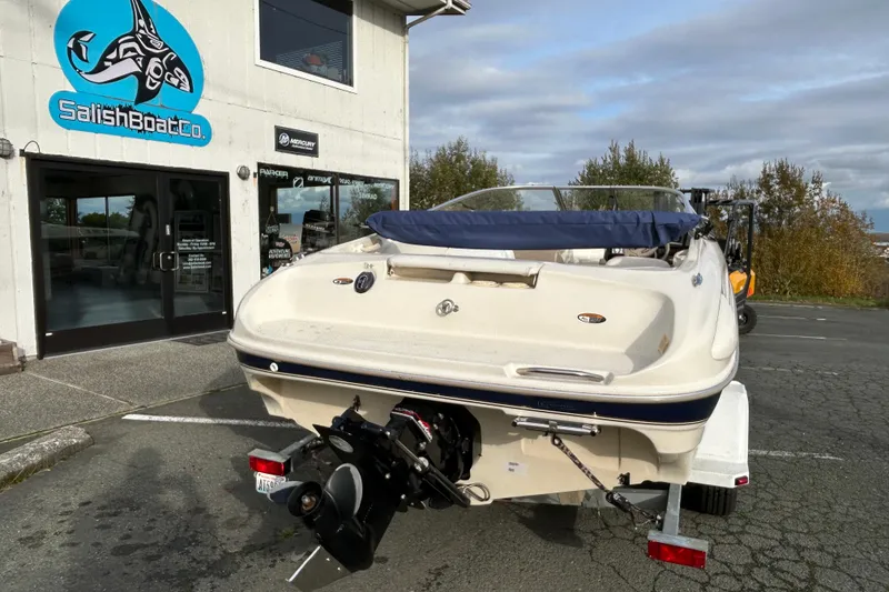 Slide: The Image of 1999 Bayliner 1850 Capri LS boat outside Salish Boat Co. dealership. - 3