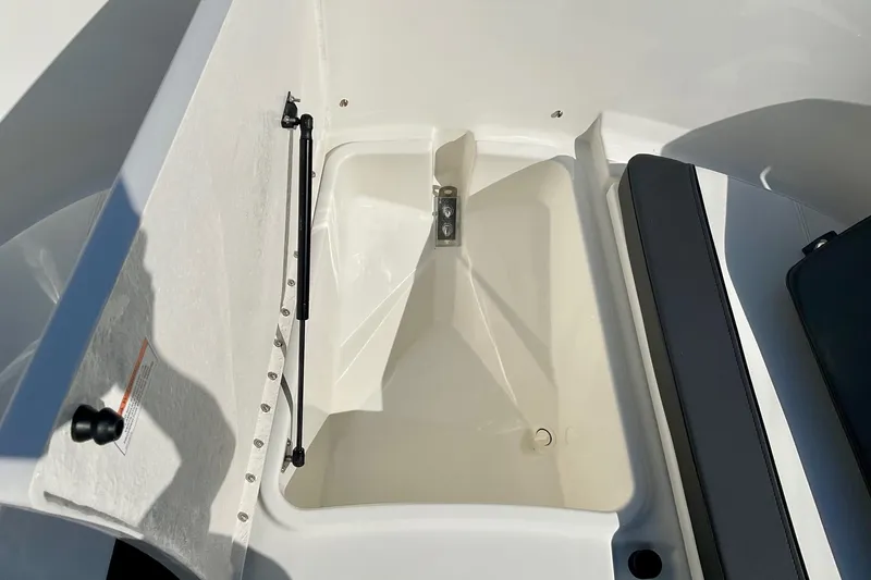 Slide: The Image of 2026 Bayliner Trophy T20CC boat storage compartment with hydraulic lift. - 10