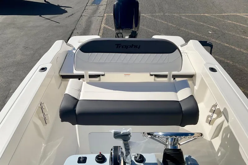 Slide: The Image of 2026 Bayliner Trophy T20CC boat interior with seating and steering wheel. - 7