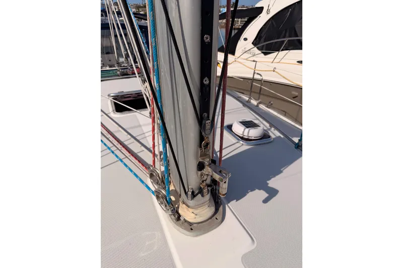 Slide: The Image of Mast and rigging of a 2005 Catalina 42 MkII sailboat in a marina. - 17