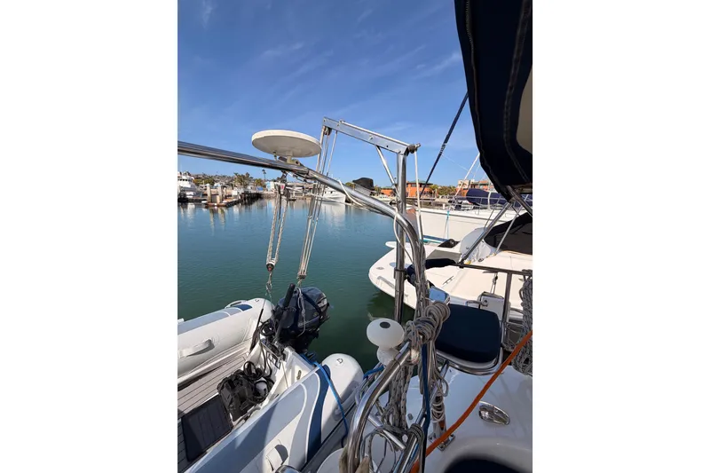 Slide: The Image of Catalina 42 MkII sailboat, 2005 model, docked with visible rigging and equipment. - 25