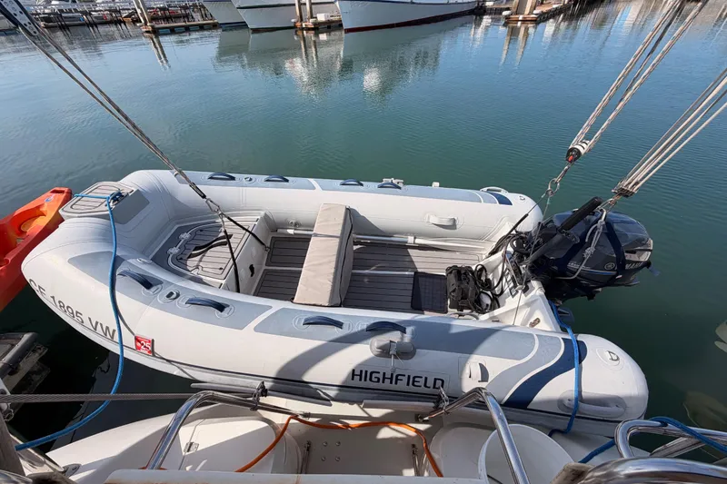 Slide: The Image of Inflatable boat docked beside a 2005 Catalina 42 MkII sailboat. - 27