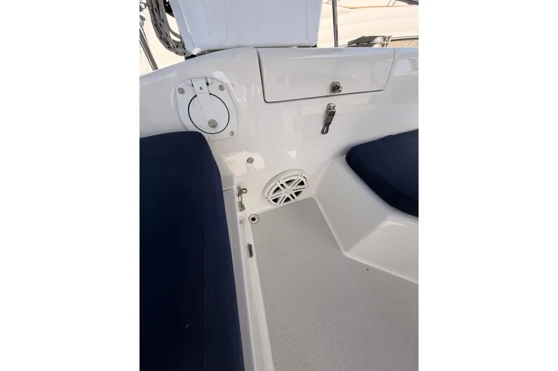 Slide: The Image of Interior view of a 2005 Catalina 42 MkII sailboat, featuring seating and storage compartments. - 32