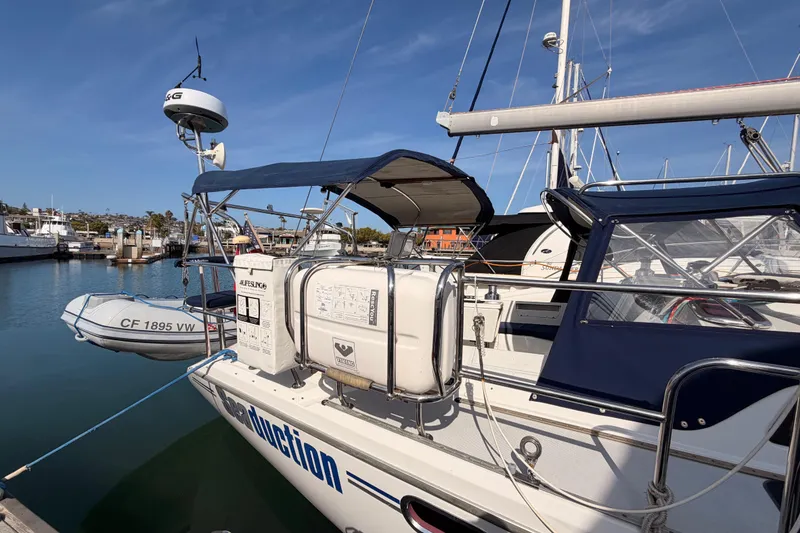 Slide: The Image of Catalina 42 MkII sailboat, 2005 model, docked with lifeboat and radar equipment. - 6