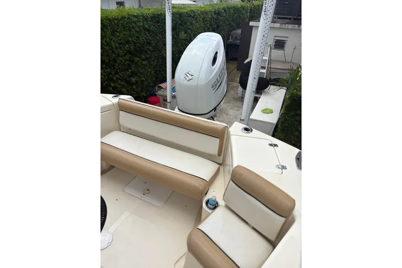 Slide: The Image of 2005 Scout 210 Sportfish boat interior with Suzuki outboard motor. - 5