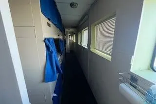 Slide: The Image of Guest Quarters, port side with 6 berths. - 33