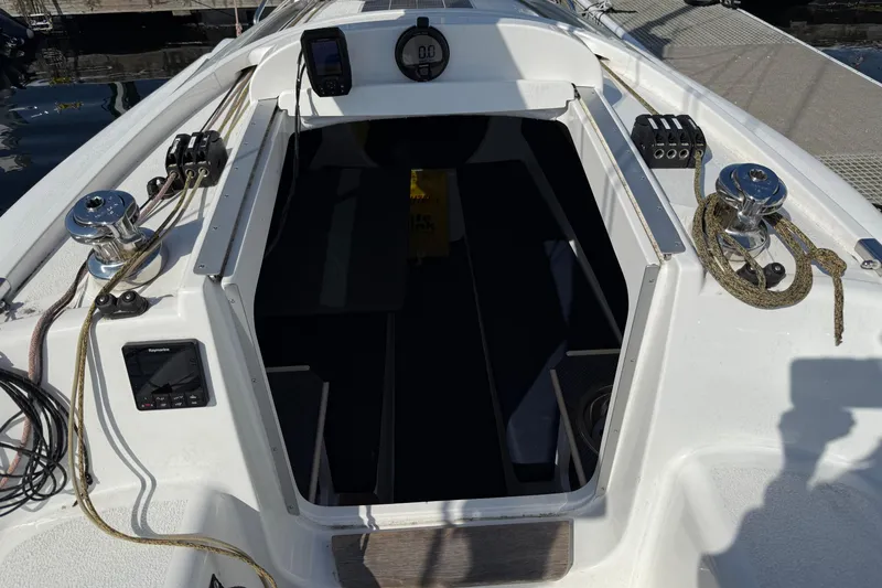 Slide: The Image of Cockpit of 2022 Dragonfly 25 sailboat with ropes and navigation equipment. - 17