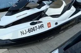 The Image of 2013 Sea-Doo GTX 215 jet ski with registration NJ-6067-HR on a dock. - 0