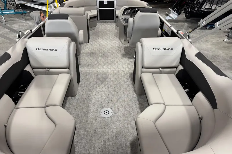 Slide: The Image of 2026 Berkshire 22 UL LE pontoon boat interior with luxurious seating and modern design. - 11