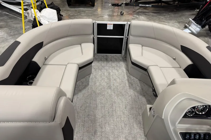 Slide: The Image of 2026 Berkshire 22 UL LE pontoon boat interior with plush seating and modern design. - 8