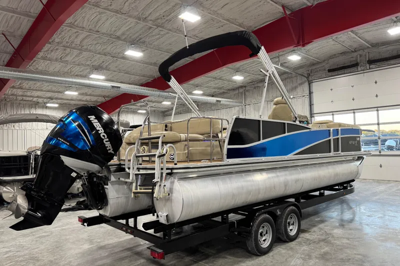 Slide: The Image of 2012 Harris Grand Mariner 250 pontoon boat with Mercury engine in a showroom. - 4