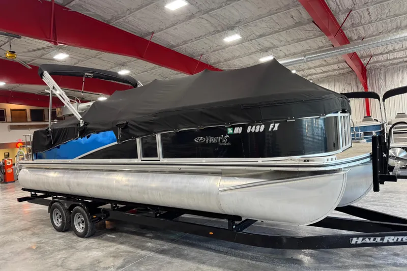 Slide: The Image of 2012 Harris Grand Mariner 250 pontoon boat with cover, on trailer in indoor storage. - 6