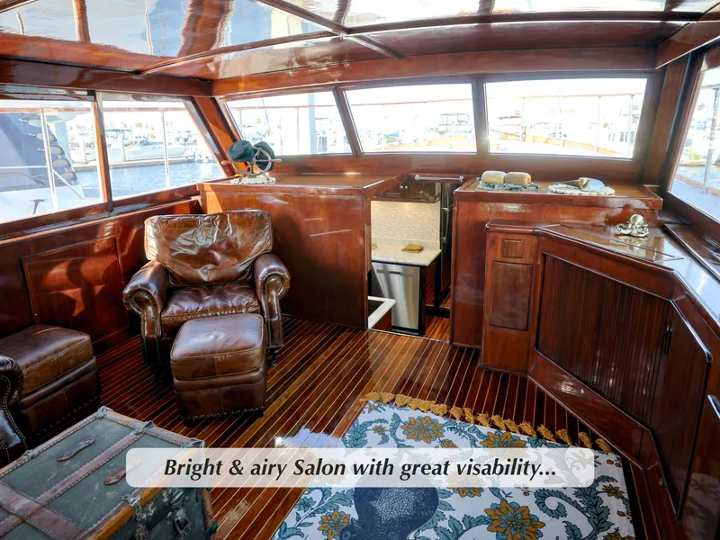 Slide: The Image of Bright and airy salon of 1968 Stephens Motor Yacht with leather seating and wood interior. - 2