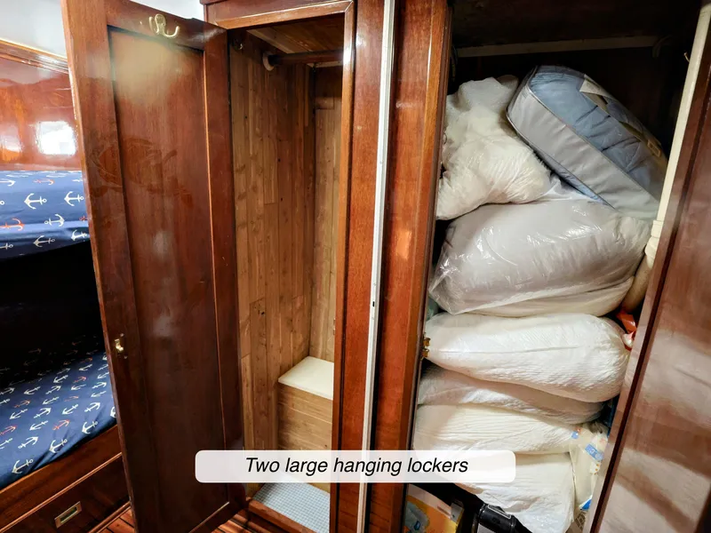 Slide: The Image of Two large hanging lockers on a 1968 Stephens Motor Yacht, with bedding storage. - 25