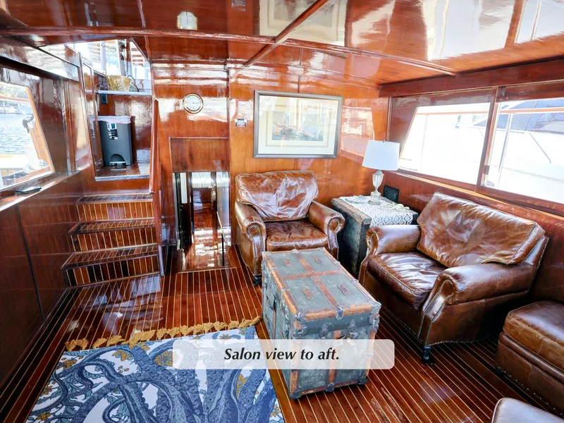 Slide: The Image of Luxurious 1968 Stephens Motor Yacht salon with leather seating and vintage decor. - 3