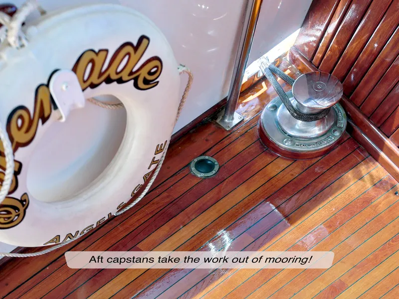 Slide: The Image of 1968 Stephens Motor Yacht deck with capstan and life preserver. - 30