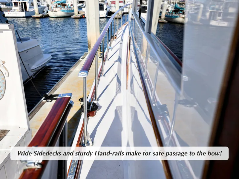 Slide: The Image of Wide side decks and handrails on 1968 Stephens motor yacht for safe passage. - 39