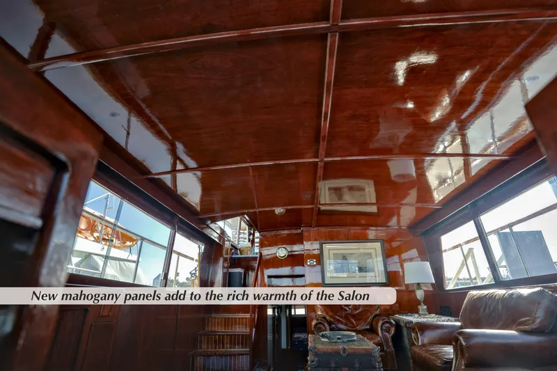 Slide: The Image of Luxurious 1968 Stephens Motor Yacht salon with rich mahogany panels and elegant decor. - 4