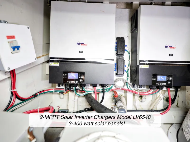 Slide: The Image of Solar inverter chargers on 1968 Stephens Motor Yacht with 3-400 watt solar panels. - 45