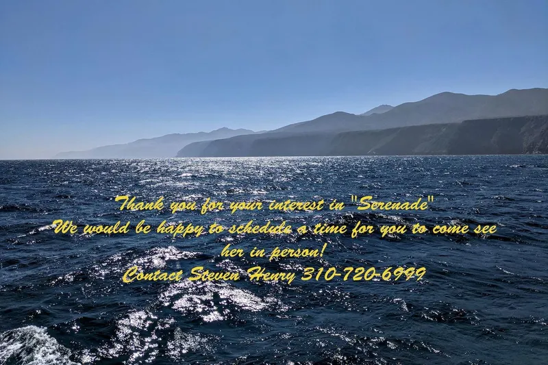 Slide: The Image of Ocean view with text about scheduling a visit to the 1968 Stephens Motor Yacht "Serenade." - 50