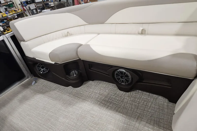 Slide: The Image of 2025 Avalon LSZ Cruise boat interior with beige seating and built-in speakers. - 5