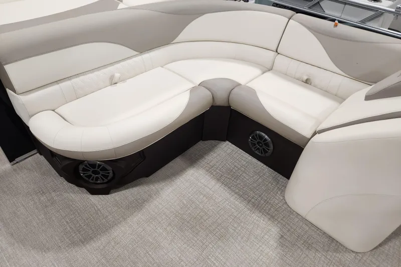 Slide: The Image of Luxurious seating on 2025 Avalon LSZ Cruise boat, featuring elegant white upholstery and integrated speakers. - 9