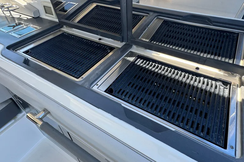 Slide: The Image of Outdoor grill setup on 2022 Sea Ray SLX 400 Outboard boat. - 32