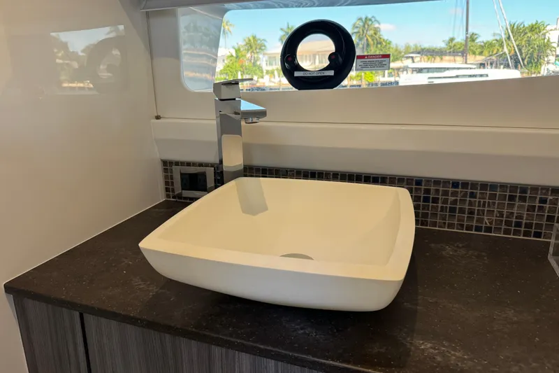 Slide: The Image of Modern bathroom sink on Sea Ray SLX 400 Outboard yacht, 2022 model. - 71