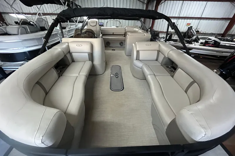 Slide: The Image of 2019 Harris CRUIZER 230 SALT EDITION pontoon boat interior with beige seating. - 24