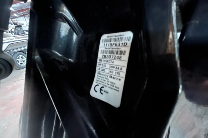 Slide: The Image of 2019 Harris CRUIZER 230 SALT EDITION pontoon boat with spacious seating in a showroom. - 28