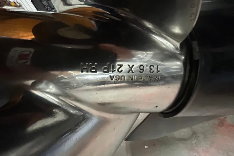 Slide: The Image of 2019 Harris CRUIZER 230 SALT EDITION pontoon boat rear view with motor and Texas license plate. - 29