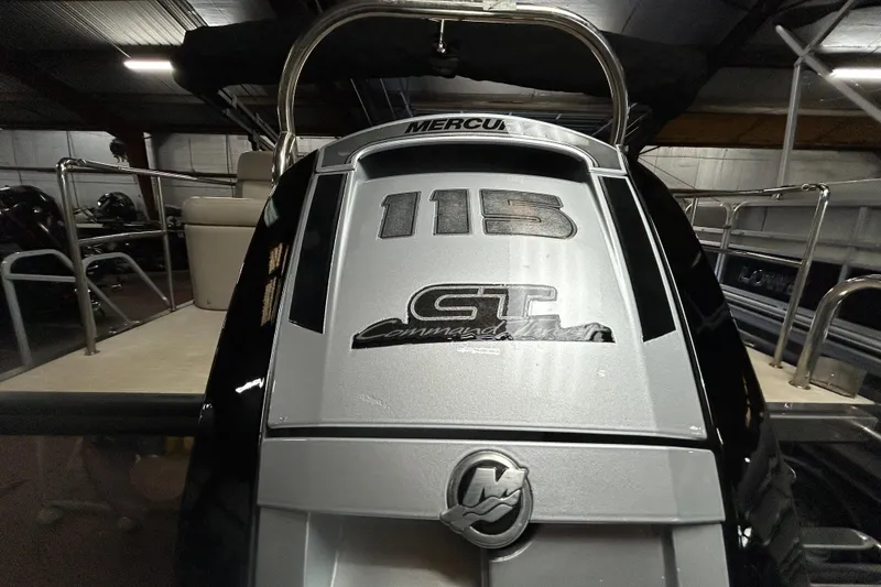Slide: The Image of 2019 Harris CRUIZER 230 SALT EDITION pontoon boat with Mercury engine in a warehouse. - 31
