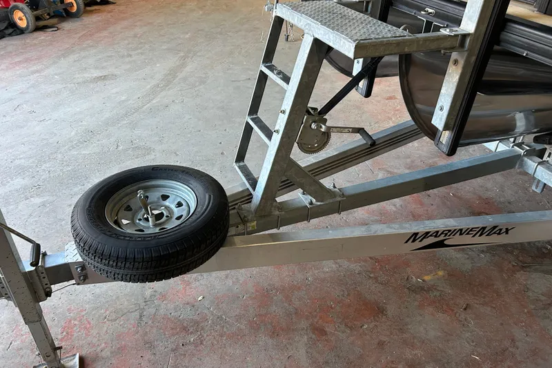 Slide: The Image of 2019 Harris CRUIZER 230 SALT EDITION logo on sleek black surface. - 37