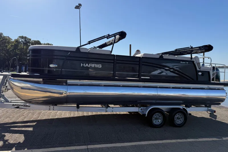 Slide: The Image of 2019 Harris CRUIZER 230 SALT EDITION pontoon boat on trailer, side view. - 48