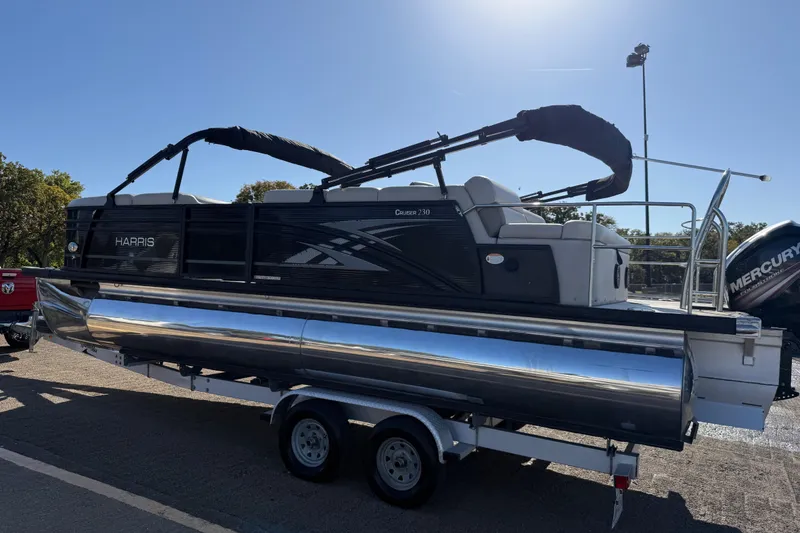 Slide: The Image of 2019 Harris CRUIZER 230 SALT EDITION pontoon boat on trailer, side view. - 49