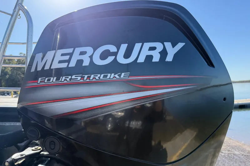 Slide: The Image of Mercury FourStroke engine on 2019 Harris CRUIZER 230 SALT EDITION boat, dockside view. - 50