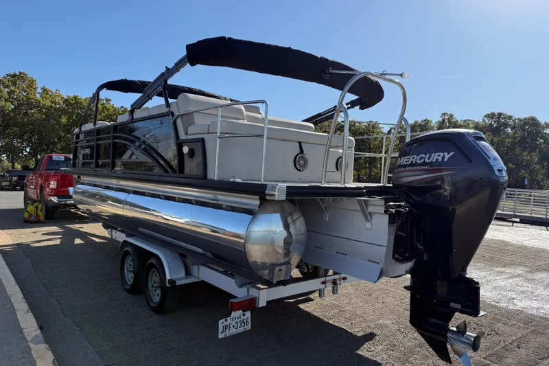 Slide: The Image of 2019 Harris CRUIZER 230 SALT EDITION pontoon boat on trailer with Mercury outboard motor. - 51