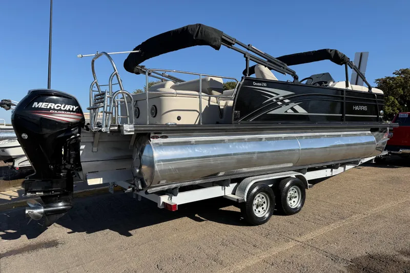 Slide: The Image of 2019 Harris CRUIZER 230 Salt Edition pontoon boat on trailer with Mercury outboard motor. - 54