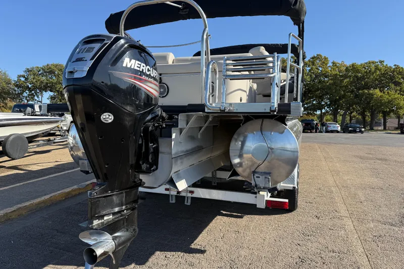 Slide: The Image of 2019 Harris CRUIZER 230 SALT EDITION boat with Mercury outboard motor. - 56
