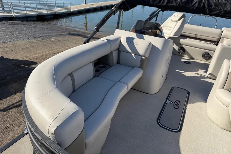 Slide: The Image of 2019 Harris CRUIZER 230 SALT EDITION pontoon boat with spacious seating and sleek design. - 69