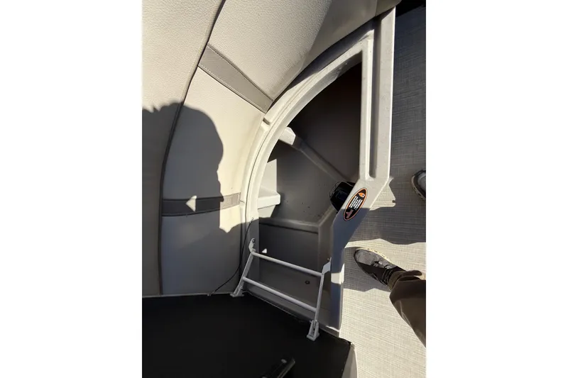 Slide: The Image of Interior view of 2019 Harris CRUIZER 230 SALT EDITION boat, featuring seating and storage. - 74